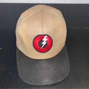 Pearl Tan Cap with Black and Red Accents